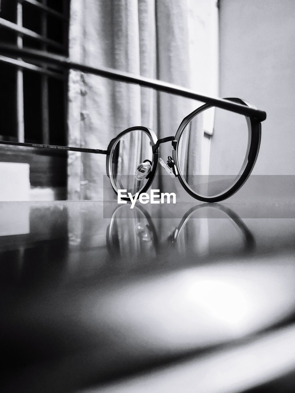 Close-up of eyeglasses on table