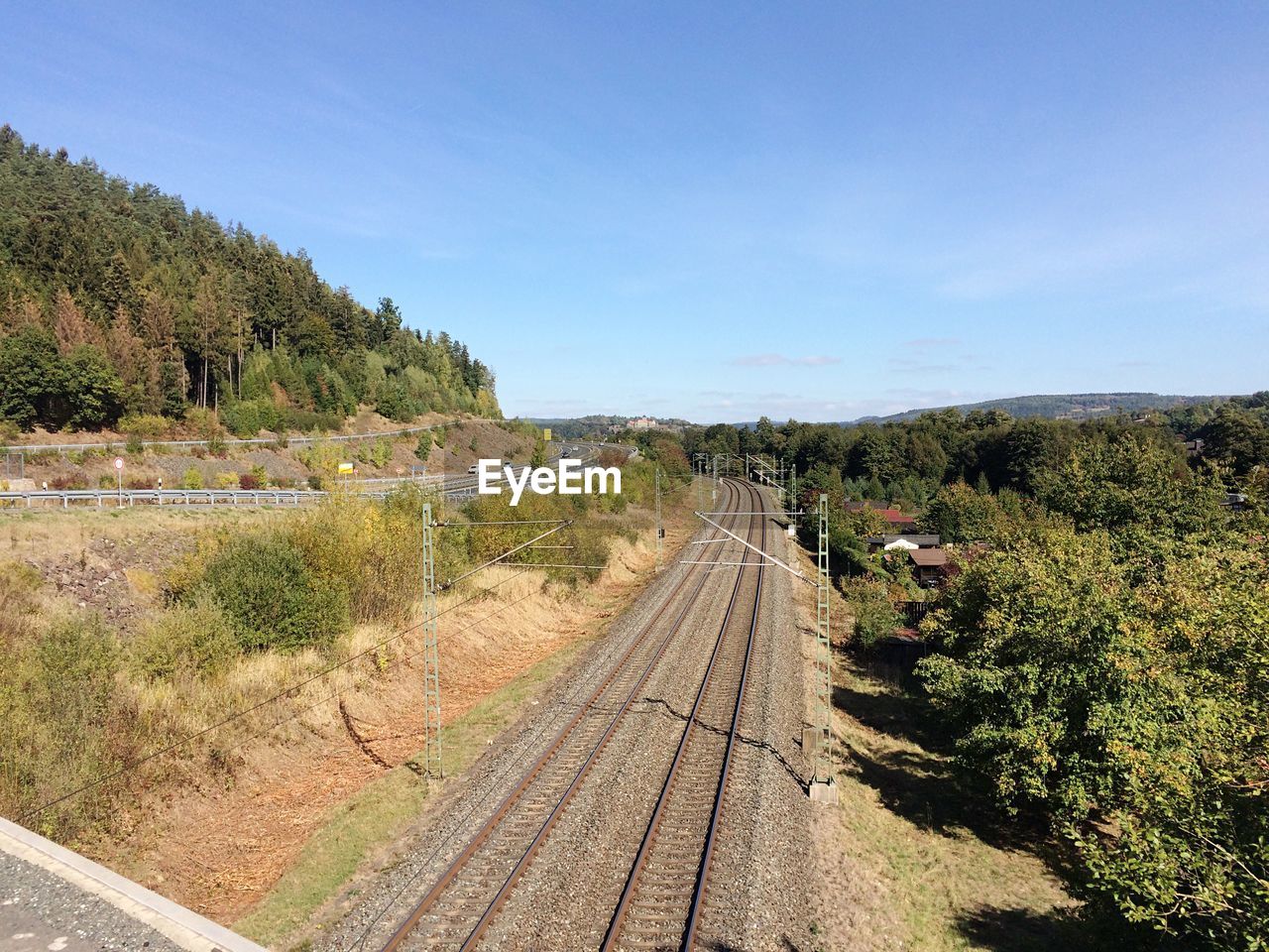 PANORAMIC SHOT OF RAILROAD TRACK AGAINST SKY