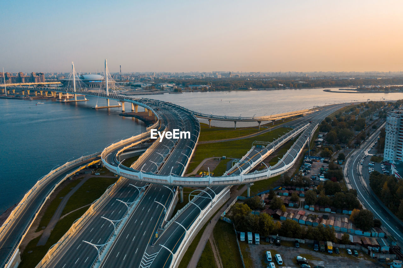 high angle view of bridge over river against sky during sunset