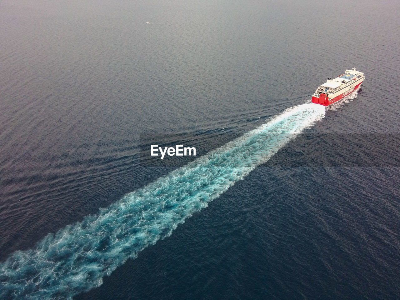 HIGH ANGLE VIEW OF SHIP ON SEA