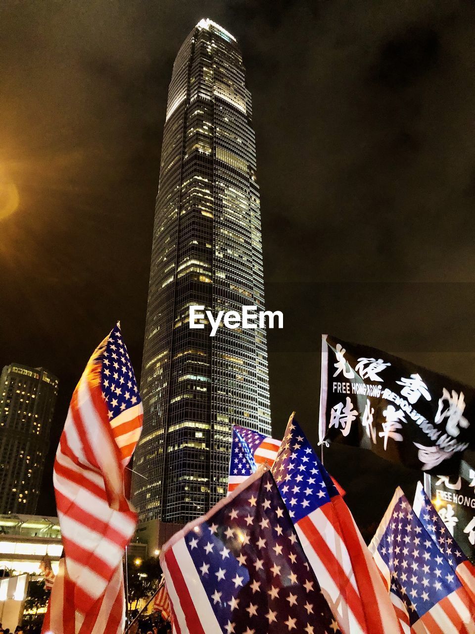 LOW ANGLE VIEW OF FLAGS AGAINST SKY