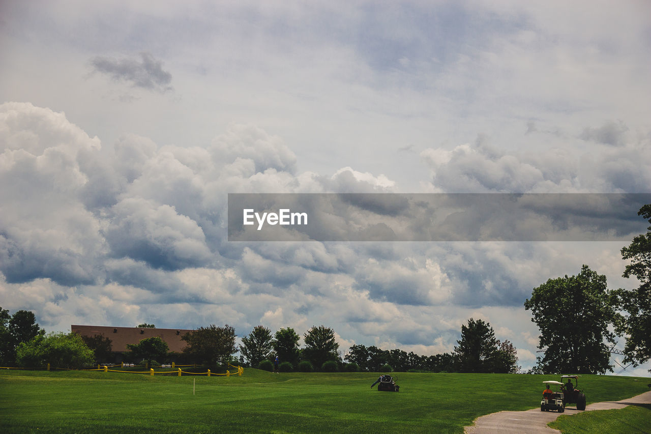 SCENIC VIEW OF GOLF COURSE AGAINST SKY