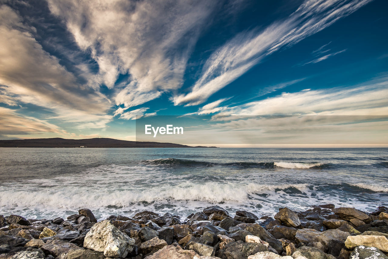 Scenic view of sea against sky during sunset