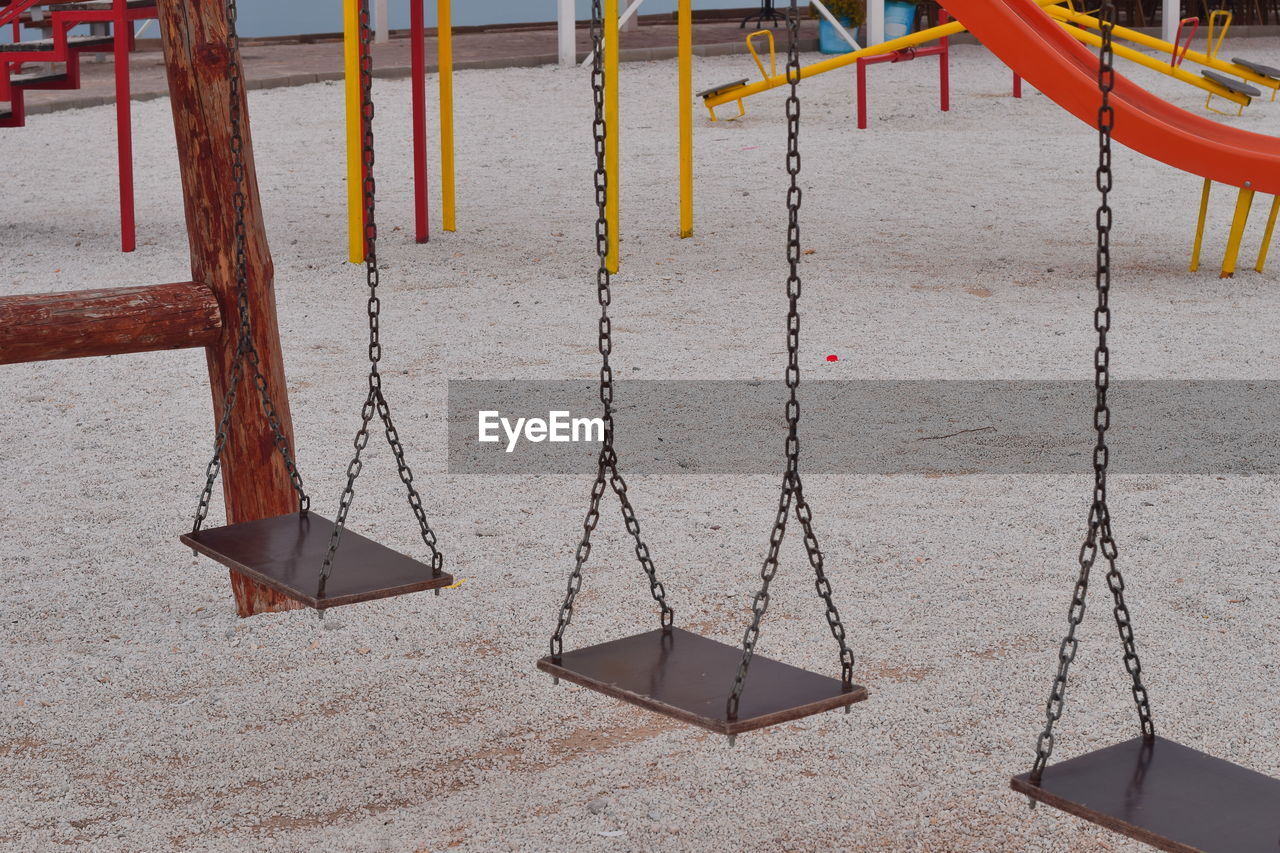 Empty swings at playground