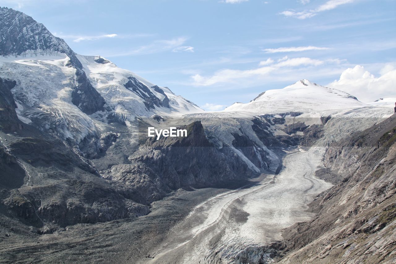Scenic view of mountains against sky during winter