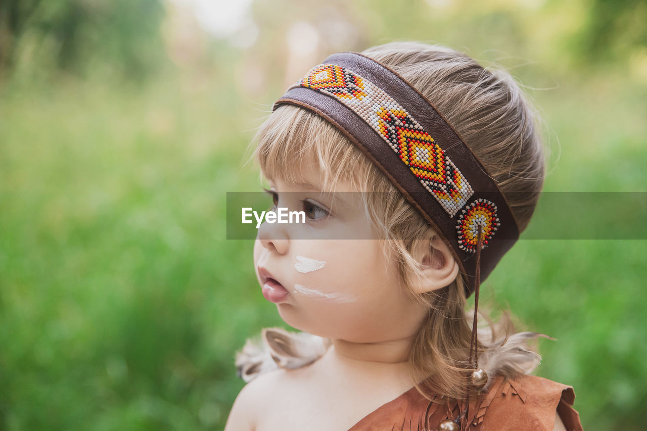 close-up of woman wearing hat