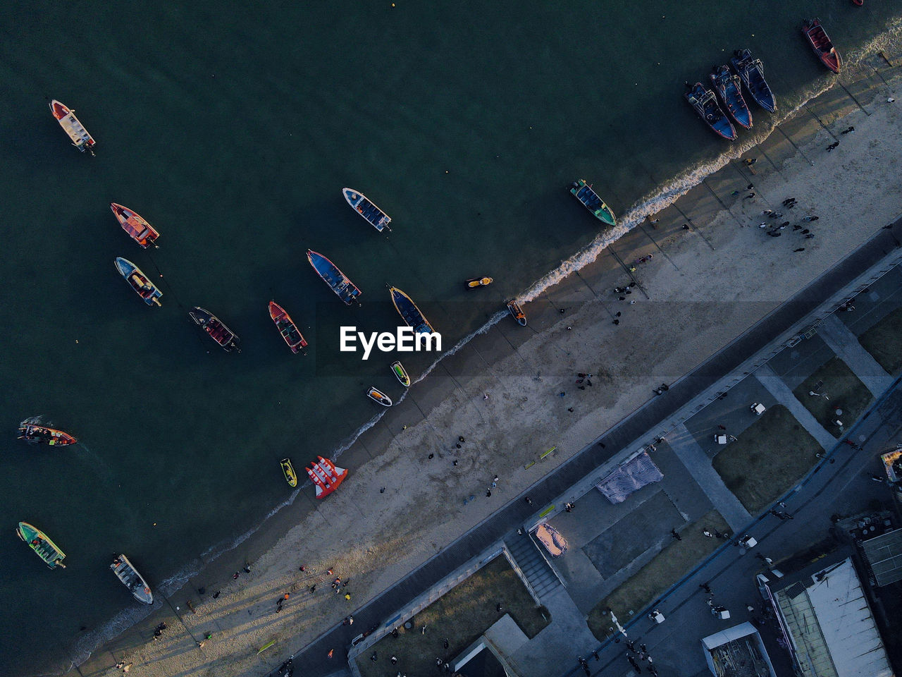 High angle view of people on boat in city