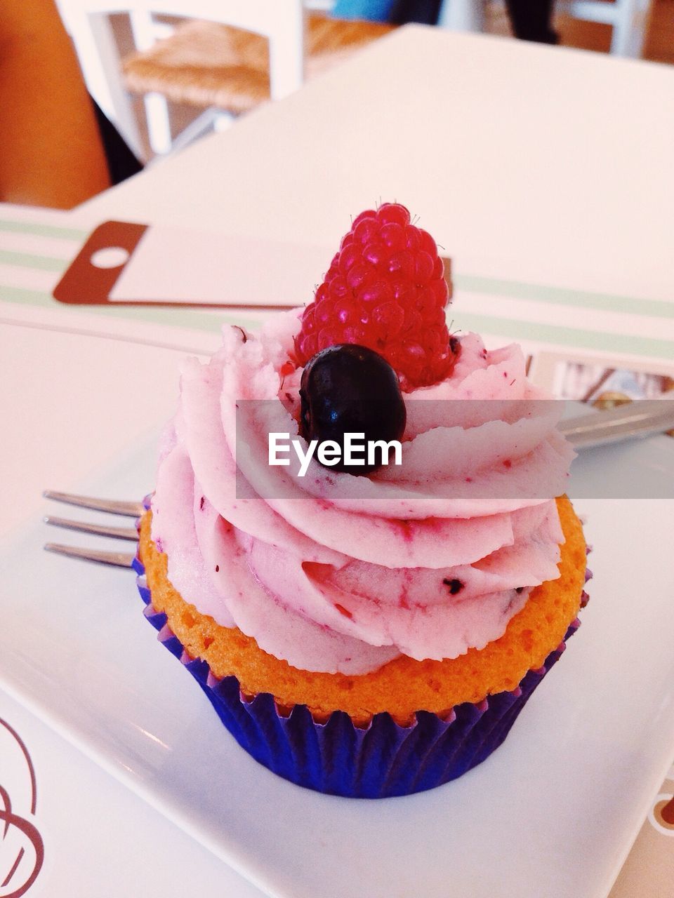 Close-up of cup cake on the table