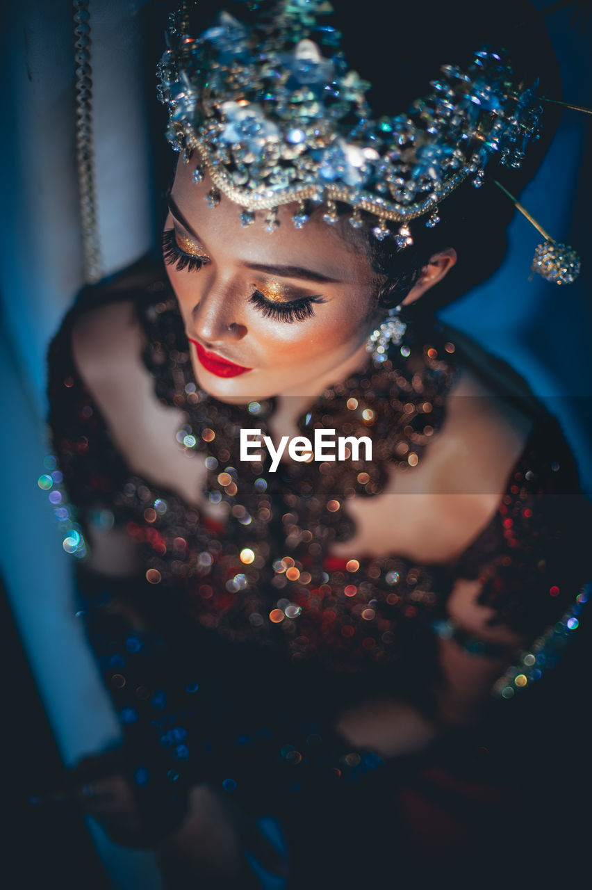 Portrait of young woman in traditional malay wedding dress. 