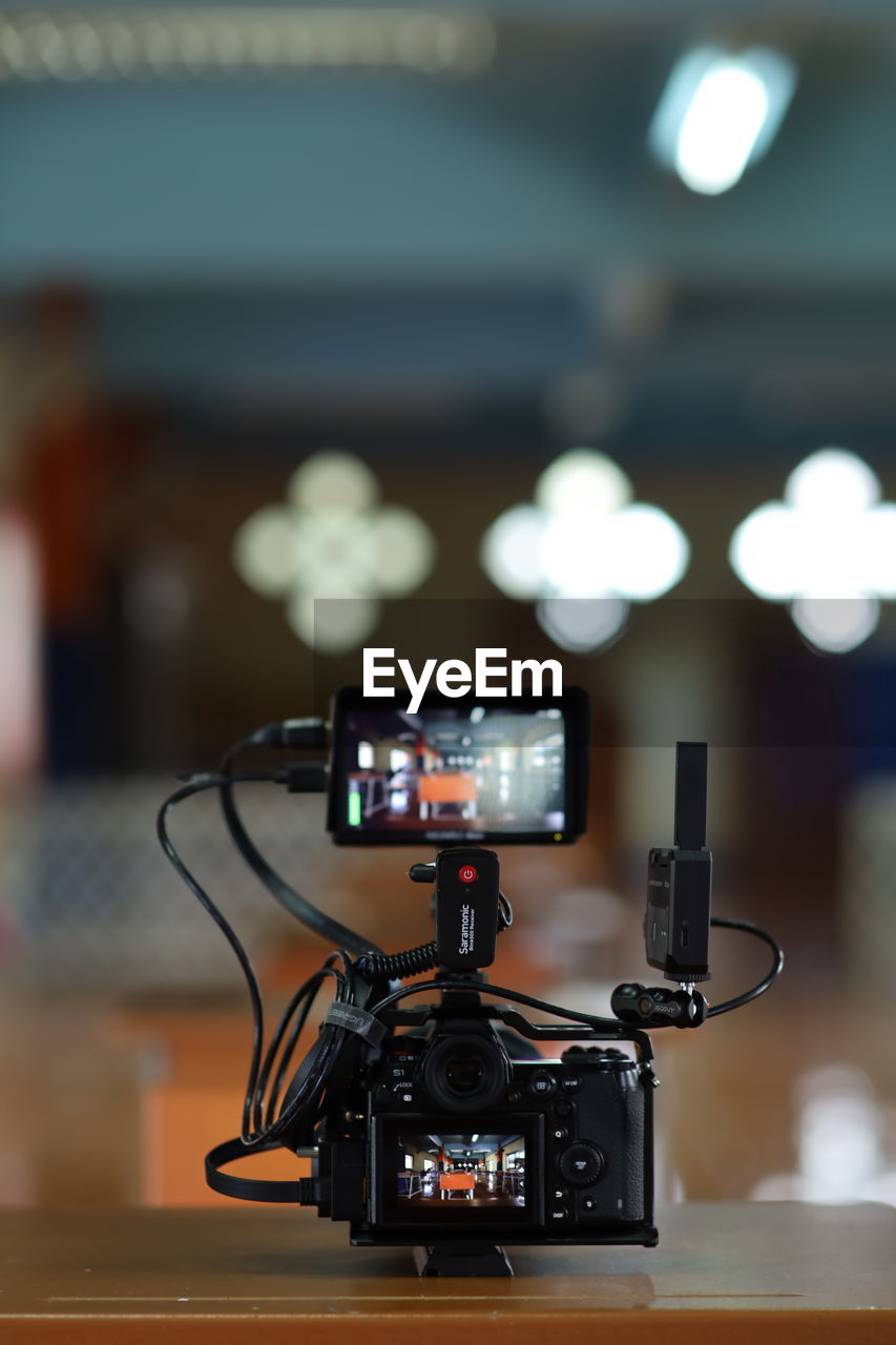 Close-up of camera on table