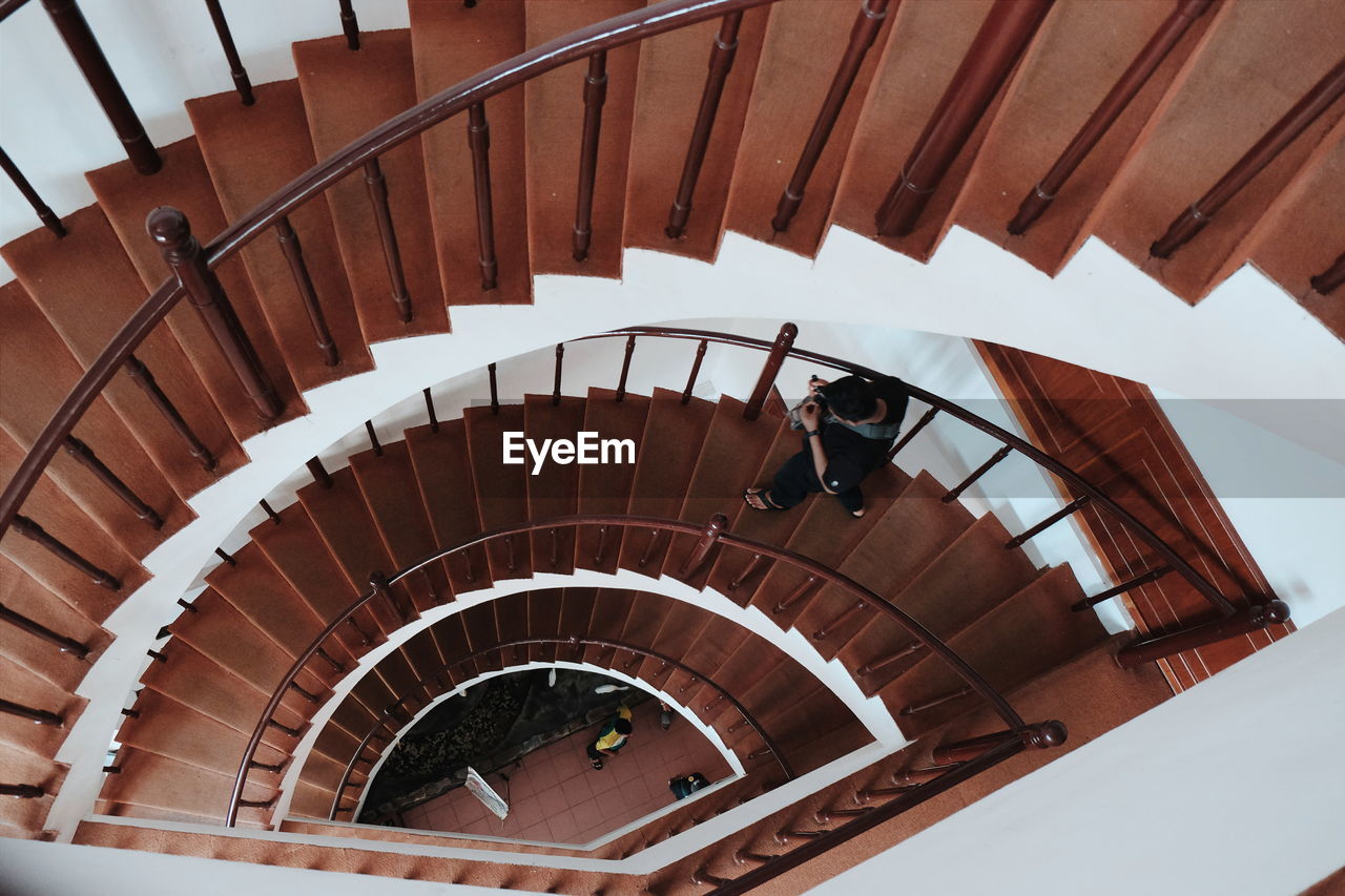High angle view of man on stairs