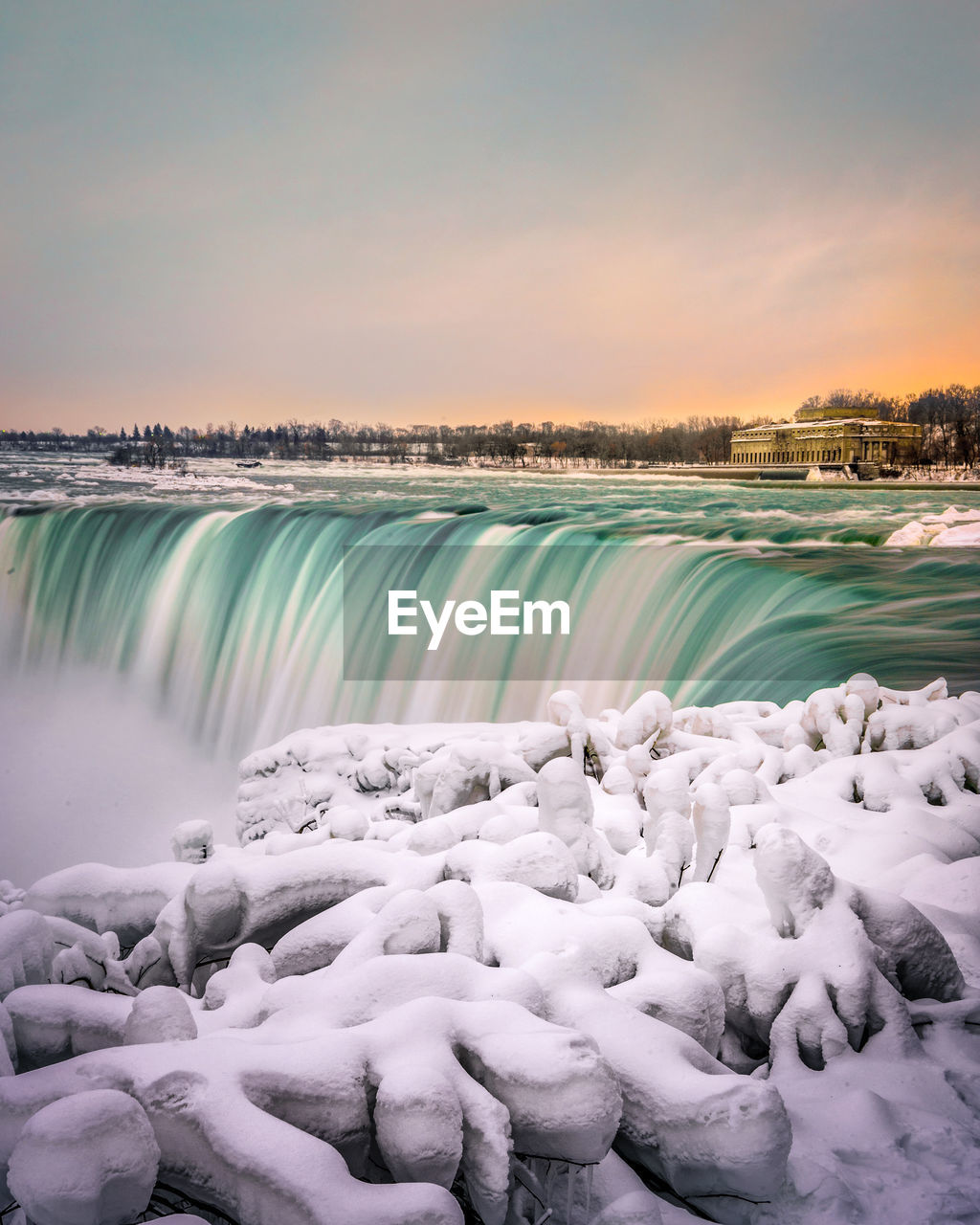 Scenic view of waterfall during winter