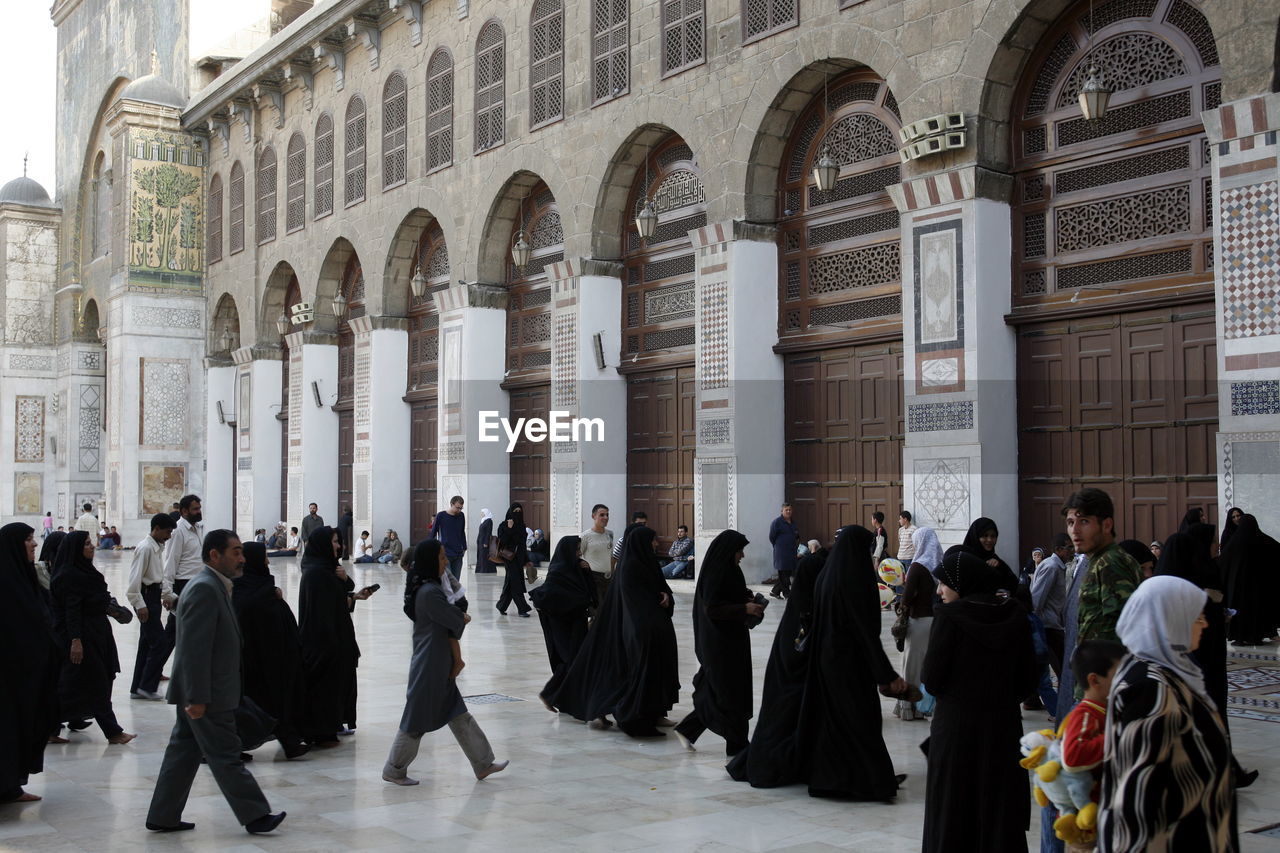 People walking at umayyad mosque