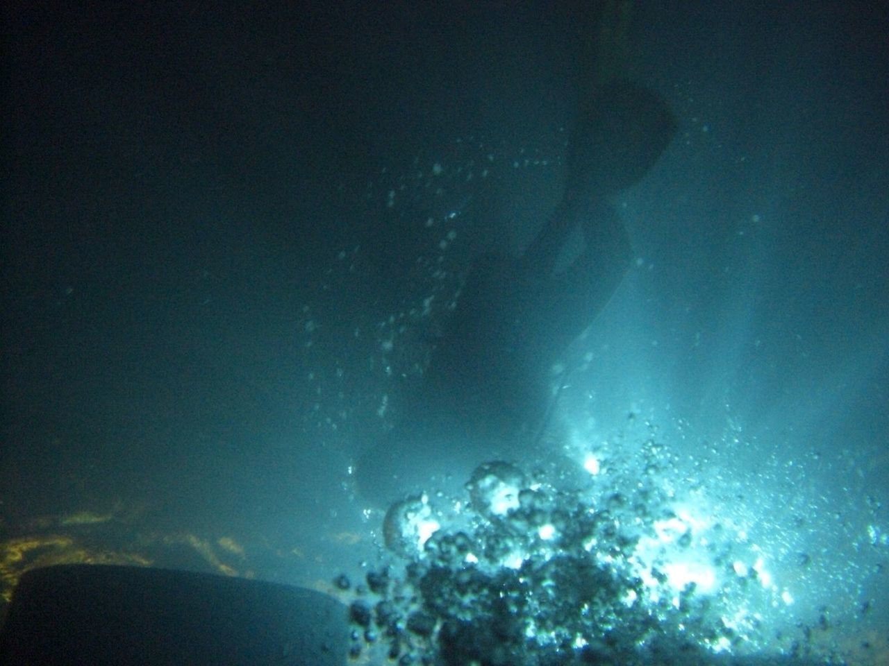 Scuba diver swimming in sea