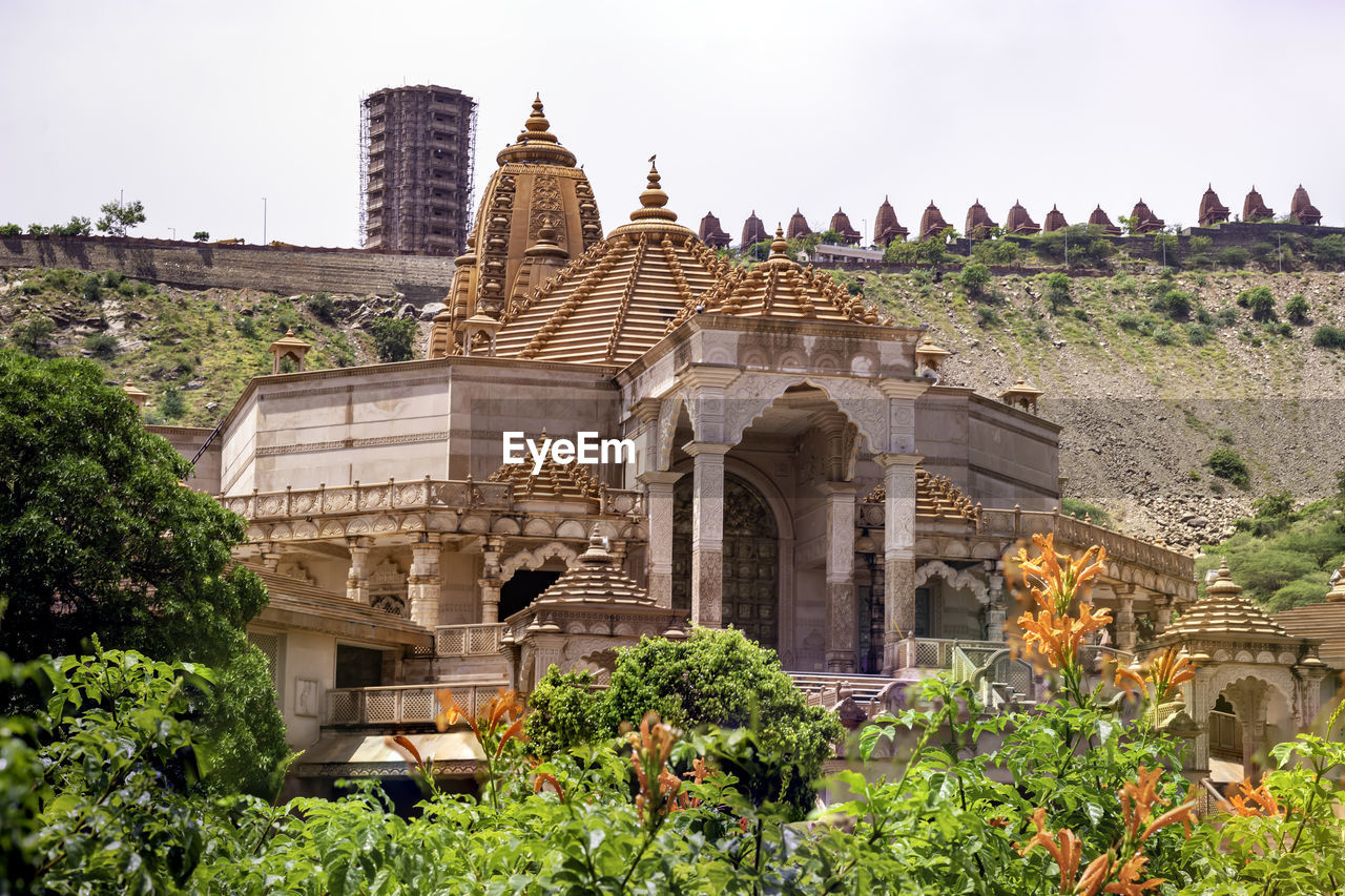 Artistic red stone jain temple at morning from unique angle