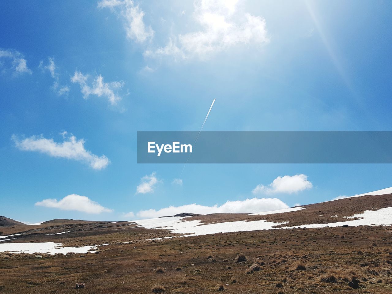 Low angle view of vapor trail against sky