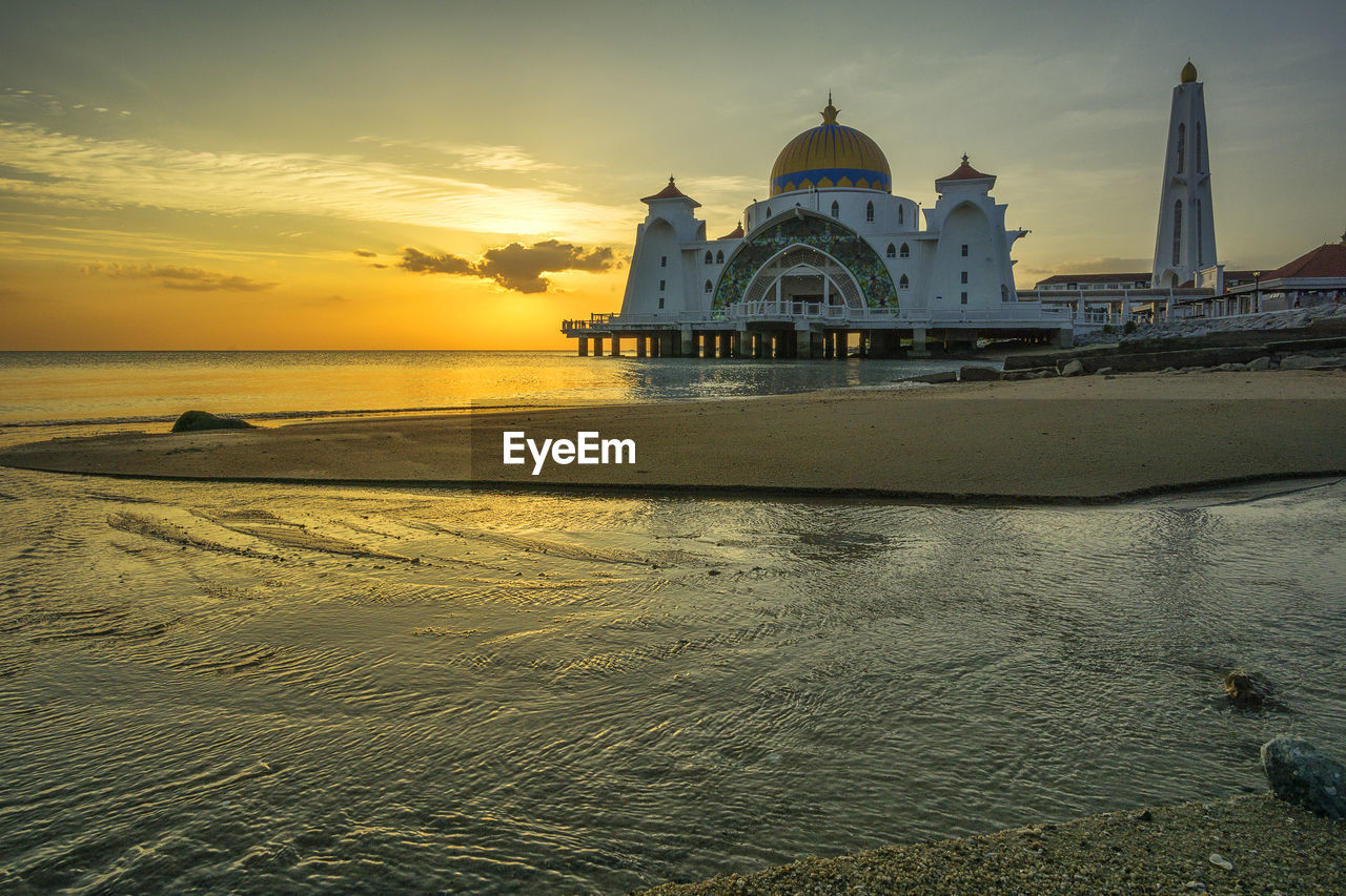 VIEW OF SEA AT SUNSET