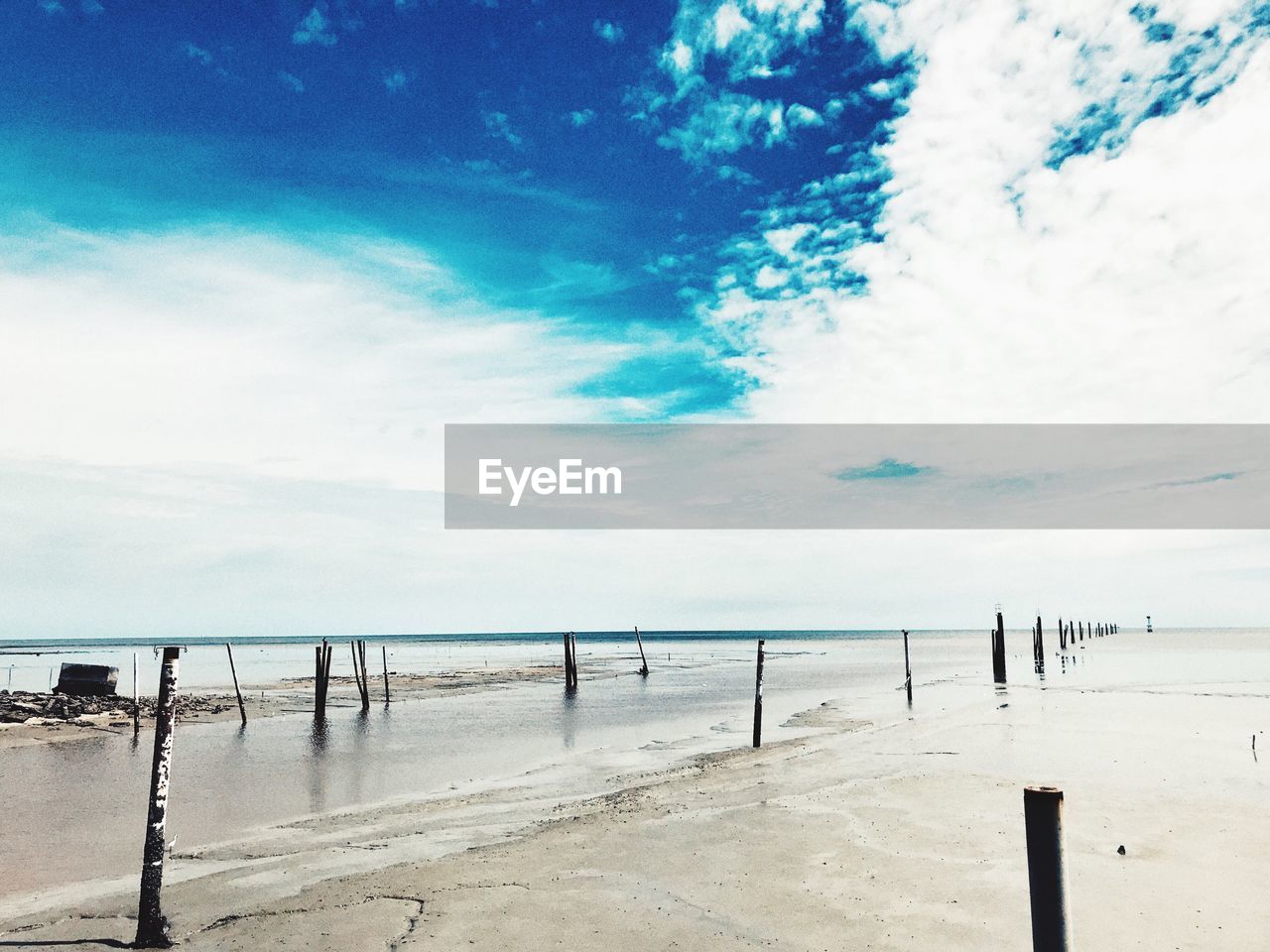 Scenic view of beach against sky