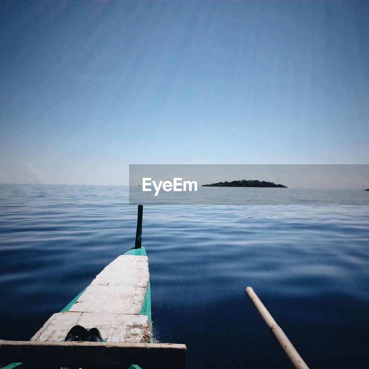 Scenic view of sea against blue sky