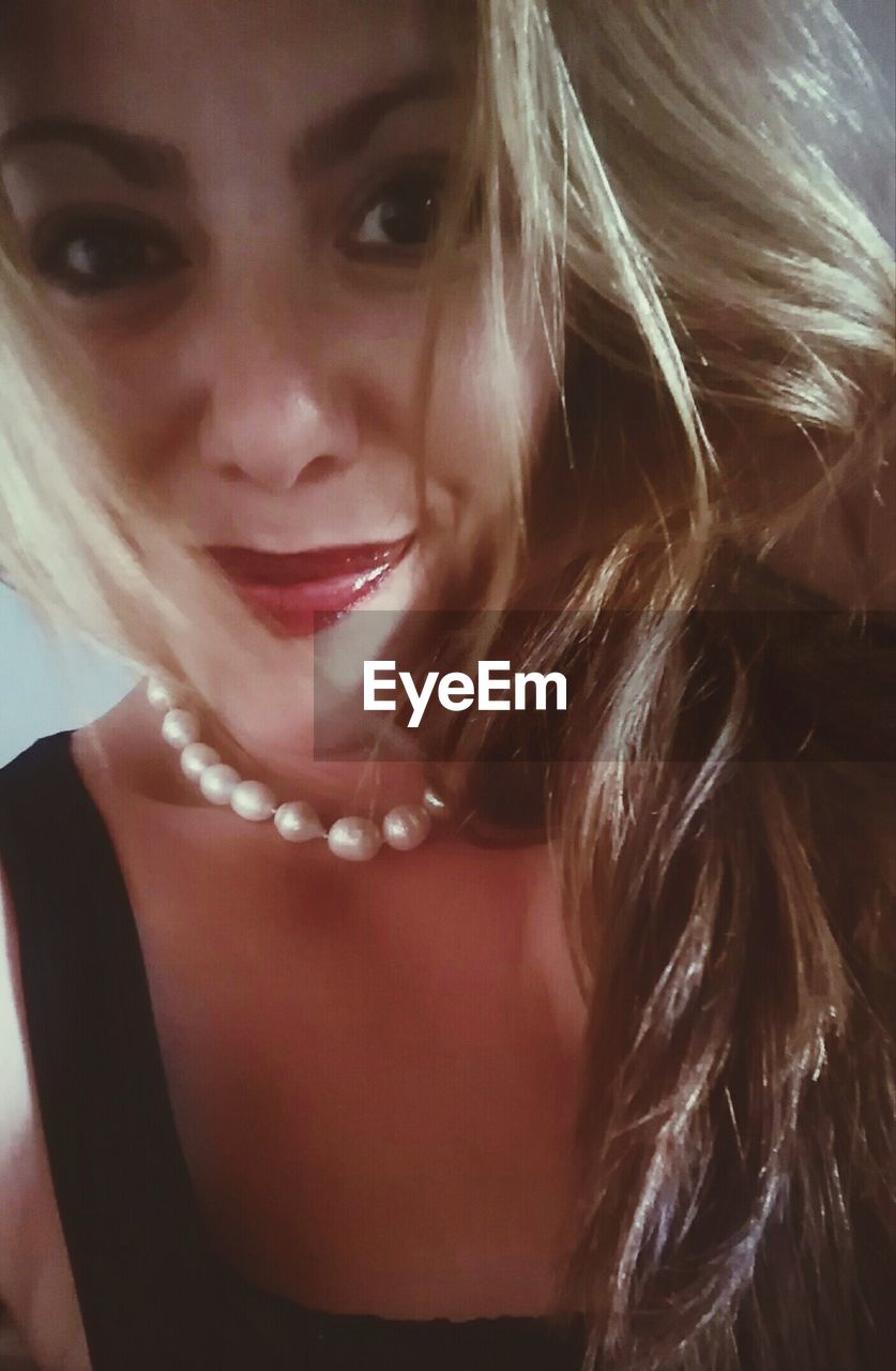 CLOSE-UP PORTRAIT OF BEAUTIFUL WOMAN