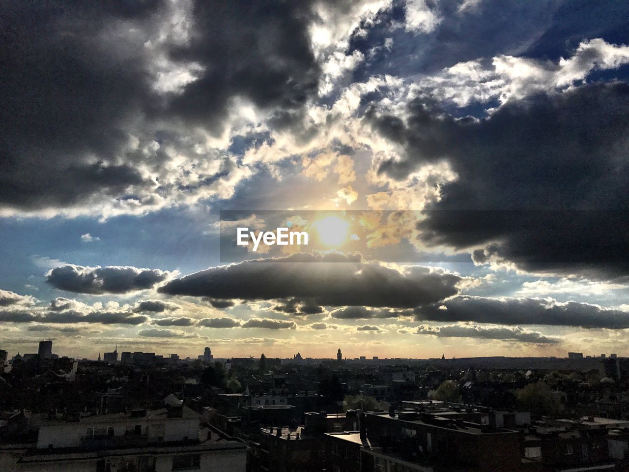 CITYSCAPE AGAINST SKY DURING SUNSET