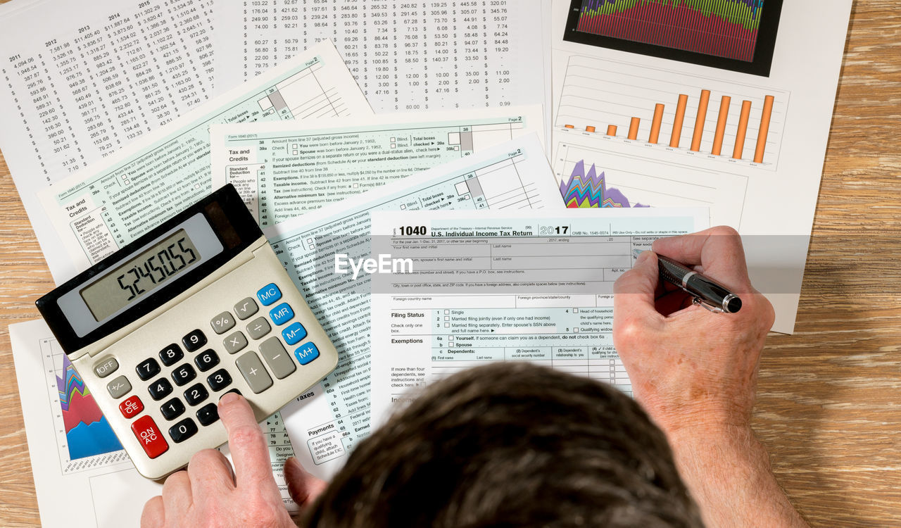 Close-up of man working on table