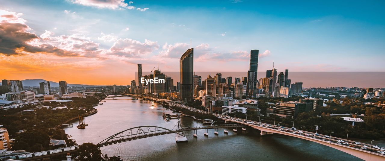 Panoramic view of buildings against sky during sunset