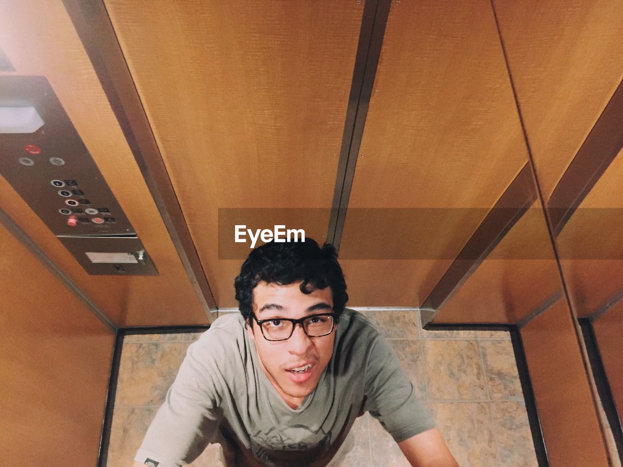 High angle view of man in elevator