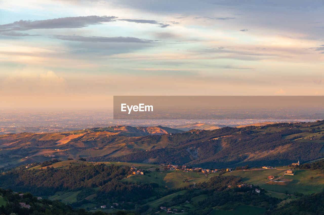 Scenic view of landscape against sky during sunset