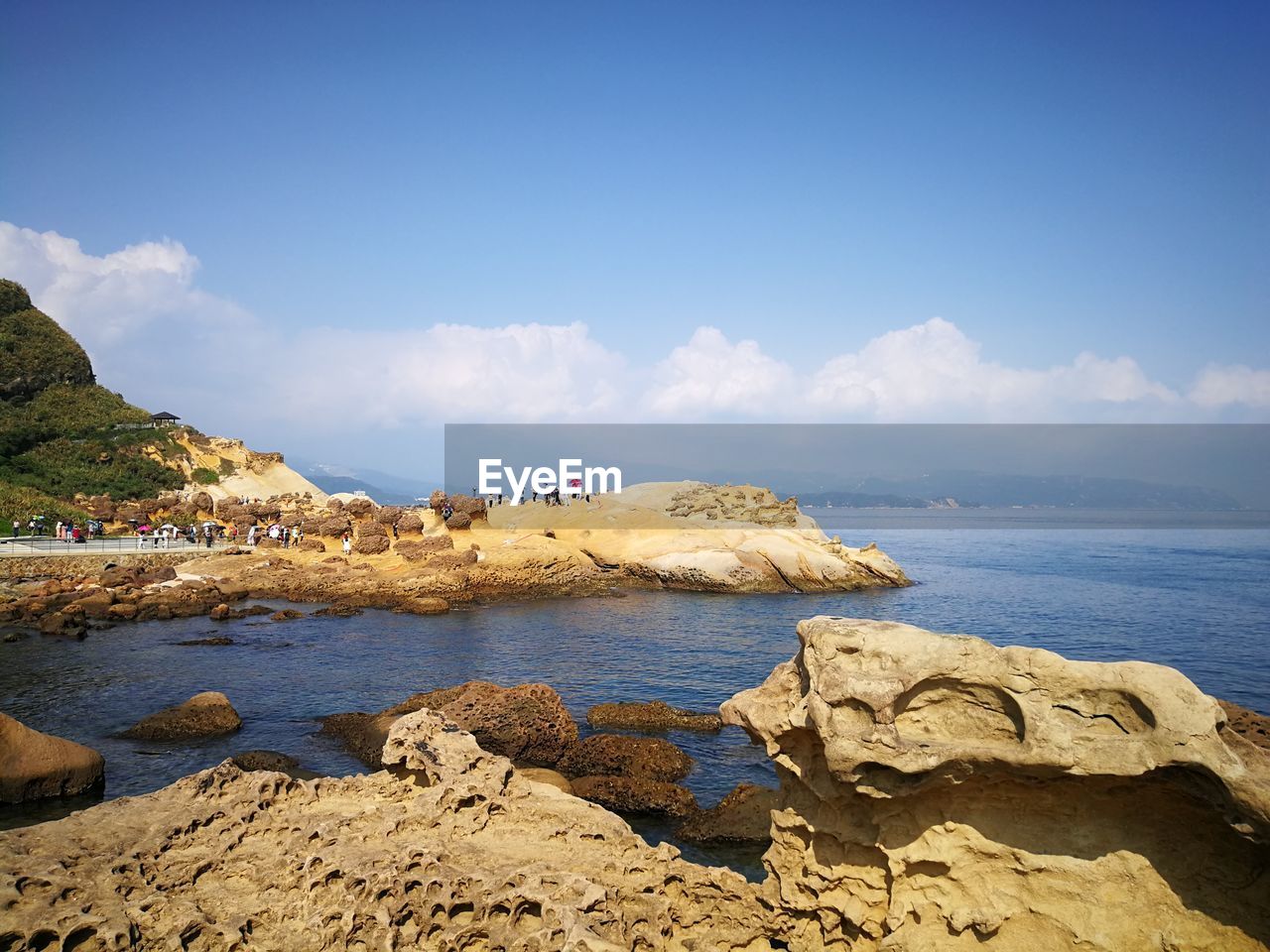 SCENIC VIEW OF SEA AND ROCK FORMATION AGAINST SKY