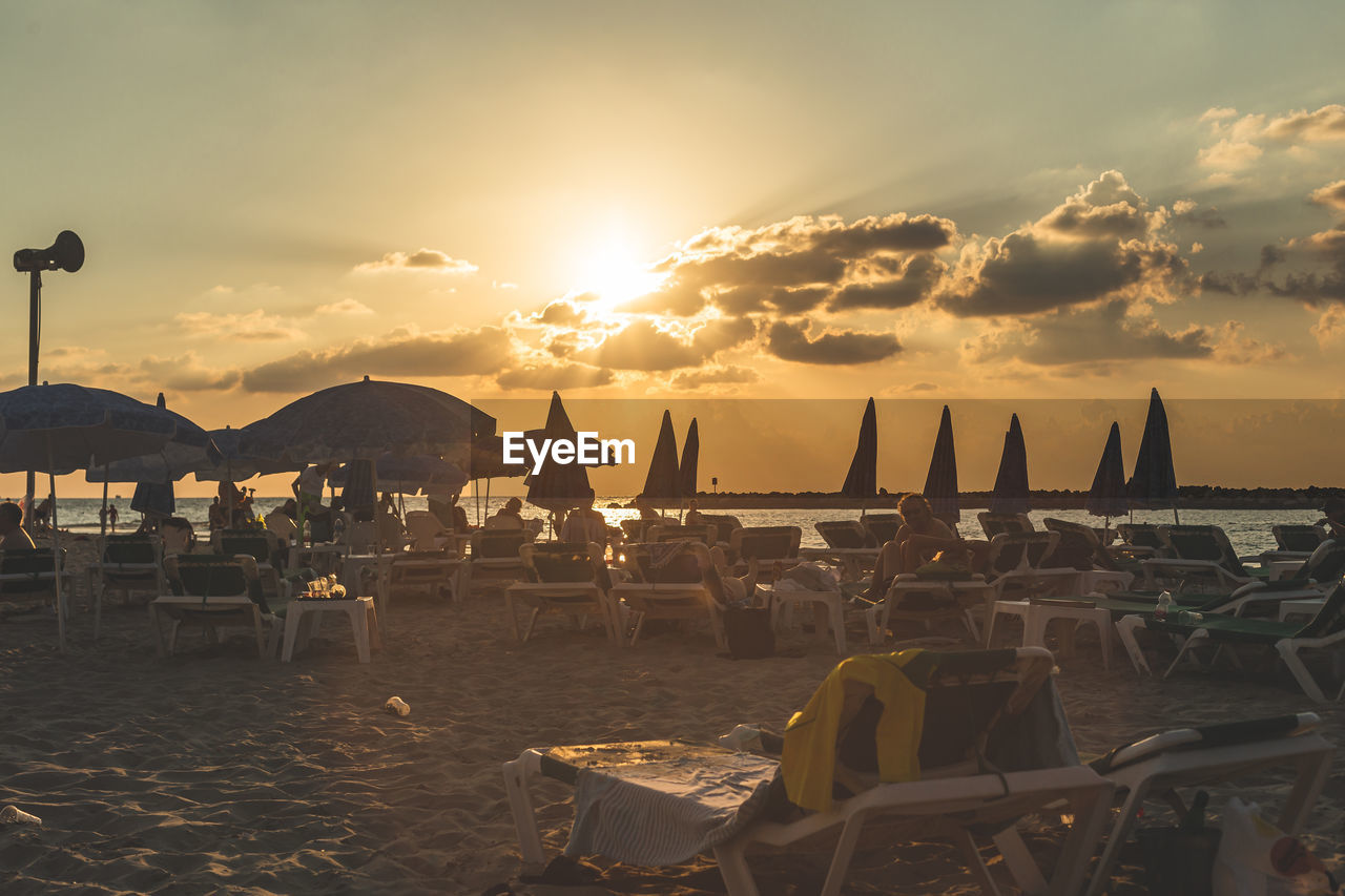 PANORAMIC VIEW OF SEA AGAINST SKY DURING SUNSET