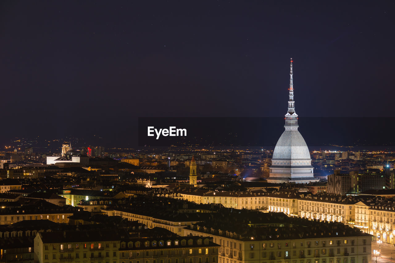 Illuminated cityscape at night