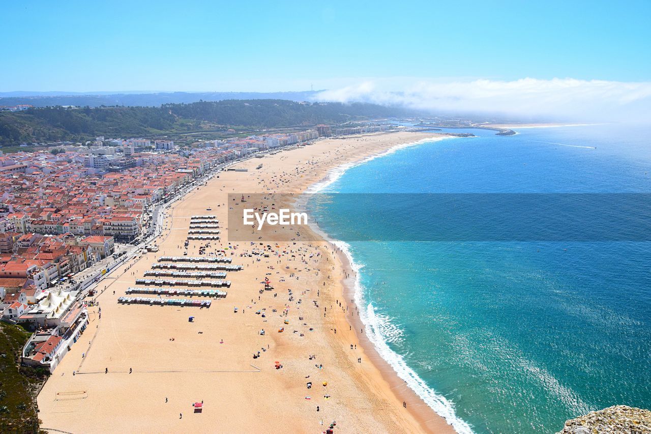 Beach and town by sea seen from miradouro do suberco