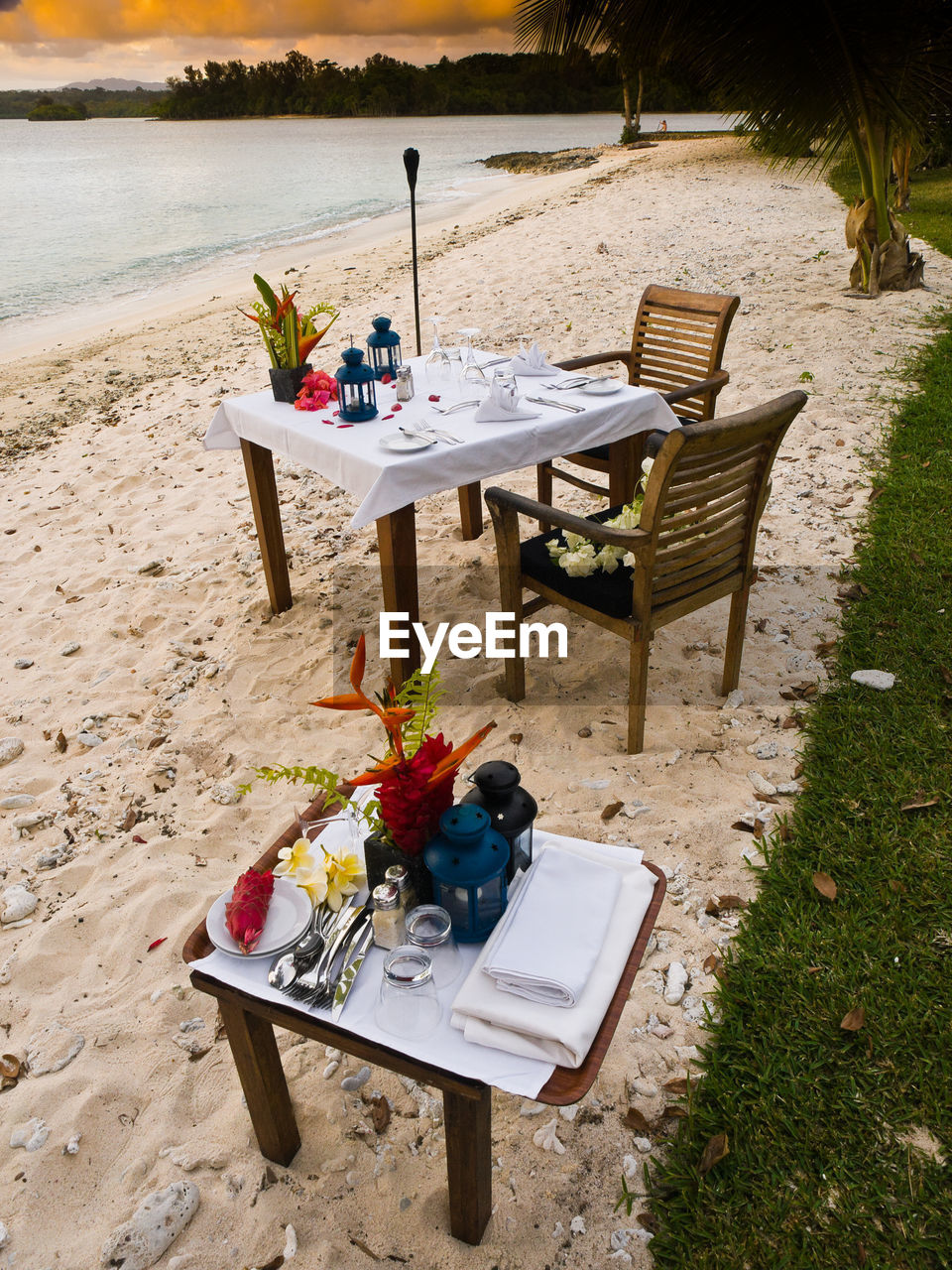 TABLE AND CHAIRS ON BEACH