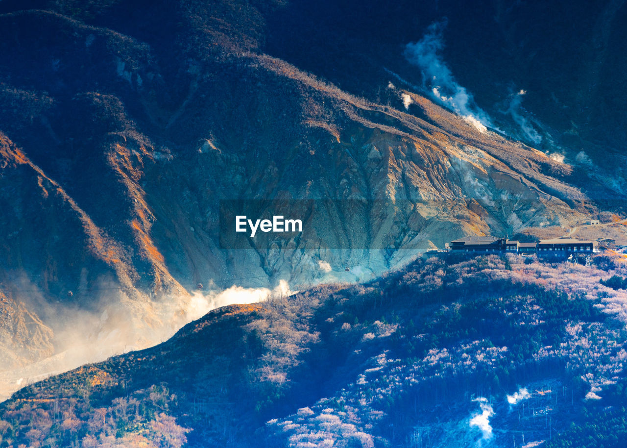 View from peak of kintokiyama of owakudani where  sulfur gases are escaping in hakone, japan.