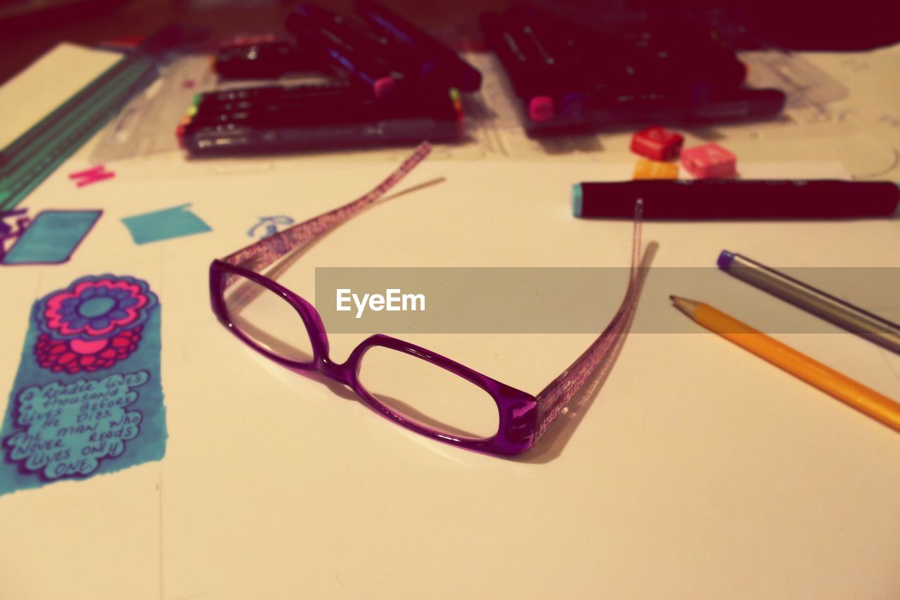 Eyeglasses on table