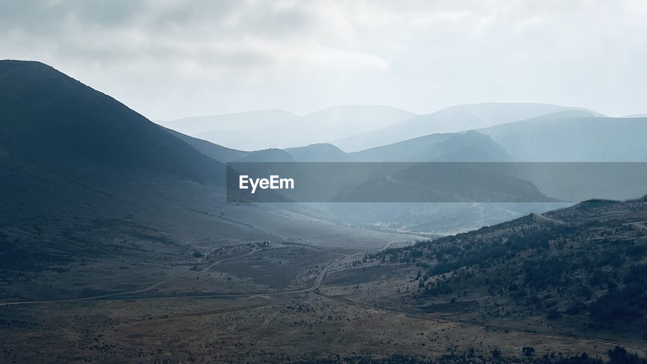 scenic view of mountains against clear sky