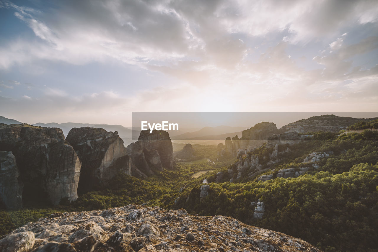 Scenic view of mountains against sky during sunset