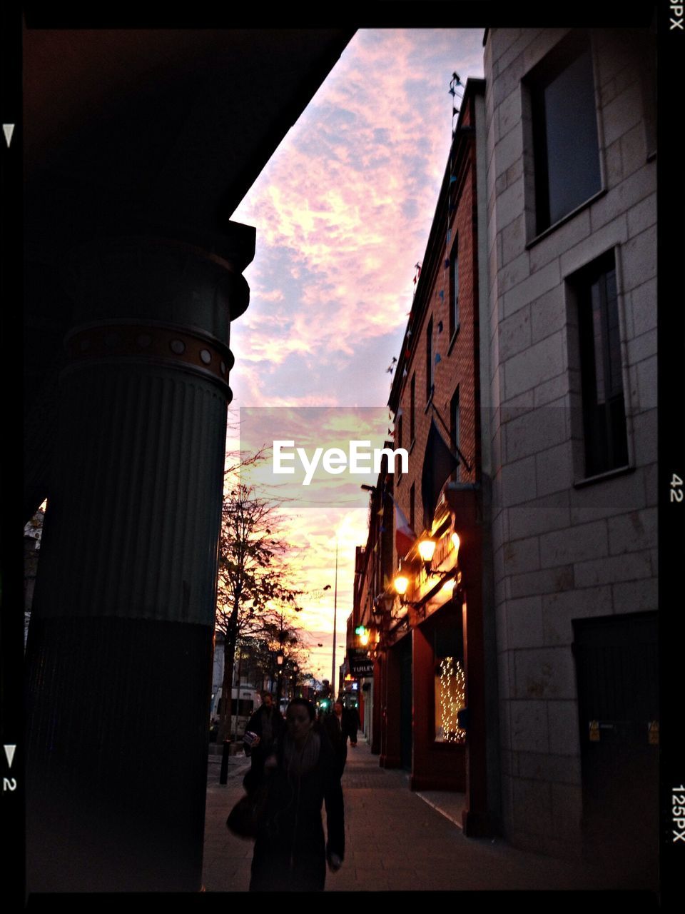 BUILDINGS IN CITY AT SUNSET