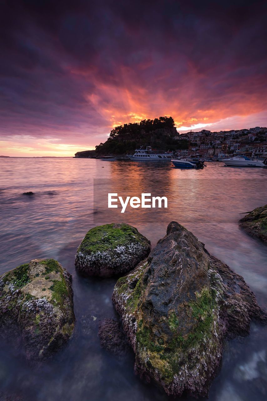 Scenic view of sea against dramatic sky