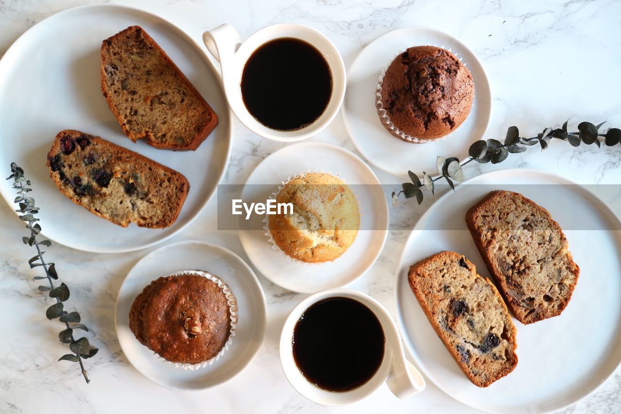 HIGH ANGLE VIEW OF COFFEE WITH COOKIES ON TABLE