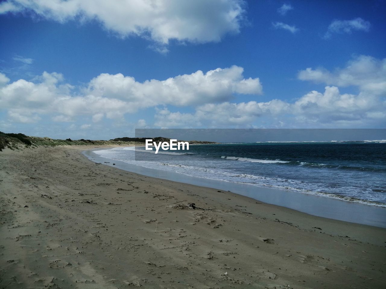 VIEW OF BEACH AGAINST SKY