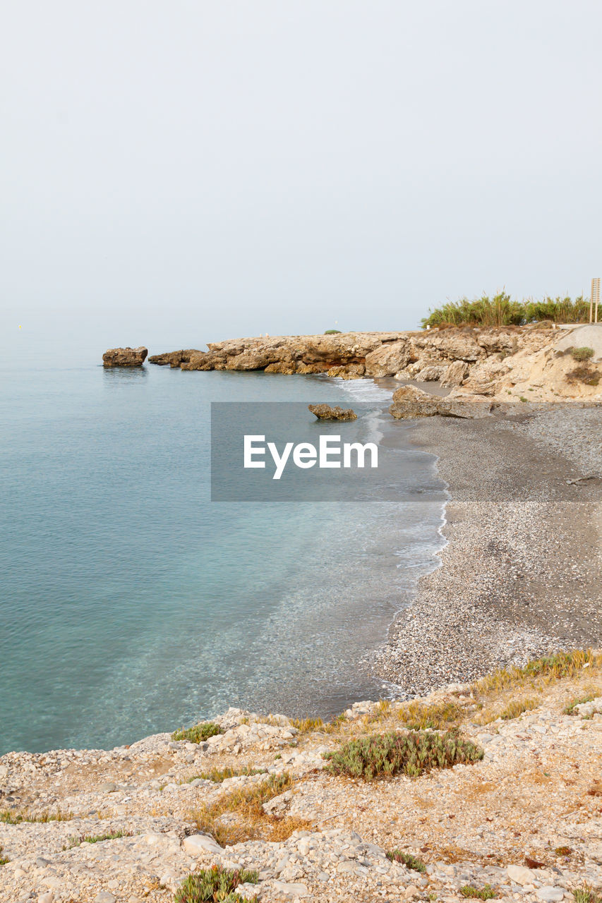 Scenic view of sea against clear sky