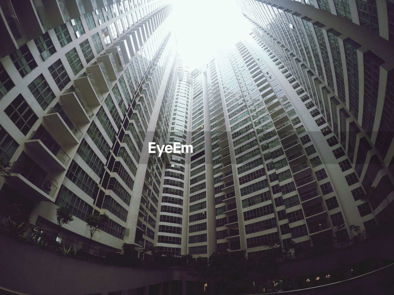 Low angle view of tall buildings against sky