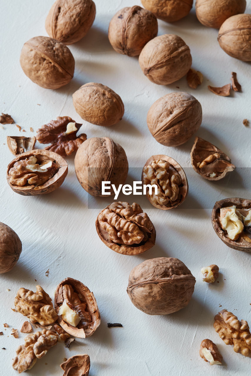 high angle view of walnuts on white background