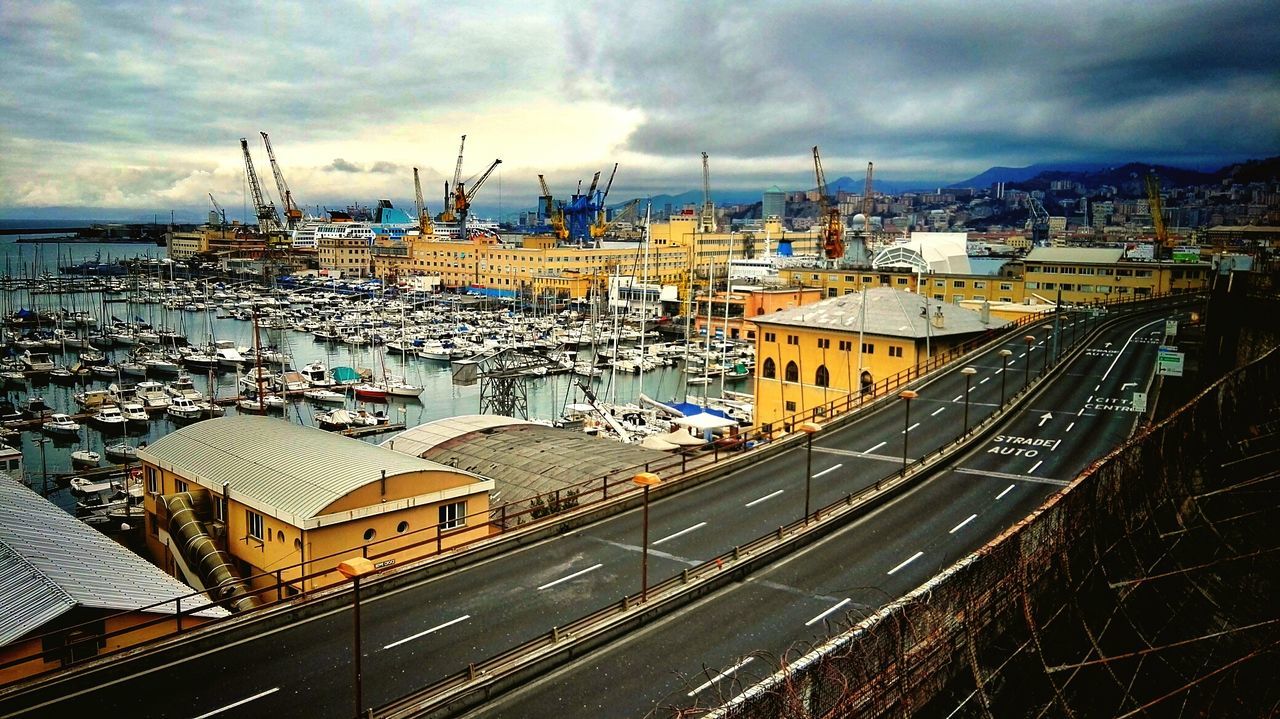 High angle view of boats moored at harbor