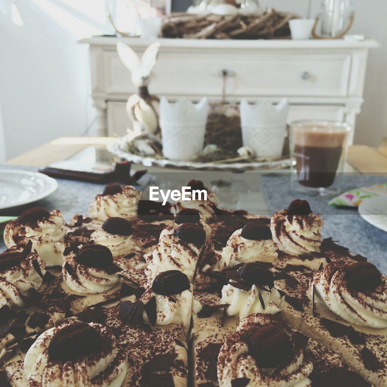 Close-up of cropped cake on table