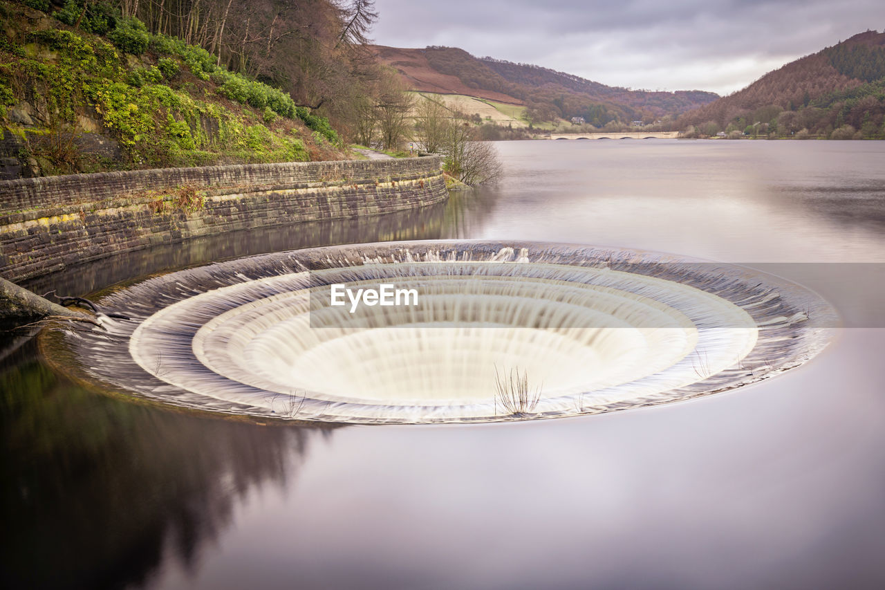 Ladybower reservoir is the lowest of three reservoirs in the upper derwent . 