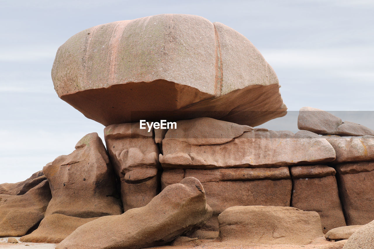 Bizarre boulders and rocks on the pink granite coast on the island of renote