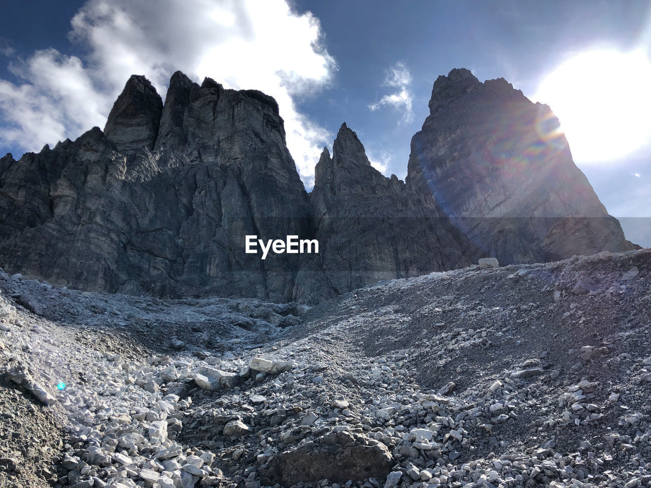 View of rocky mountains against sky